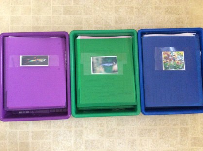 Bins with the table folders for each class period in them.